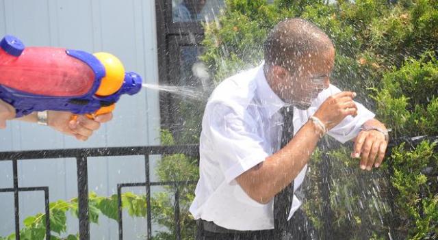 Sarang receiving his celebratory soaking after his first solo.
