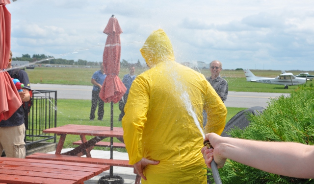 Getting sprayed in celebration.