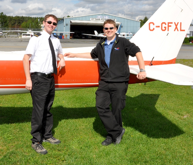 Smile!: Joshua Shea and his proud instructor Chris Busch.