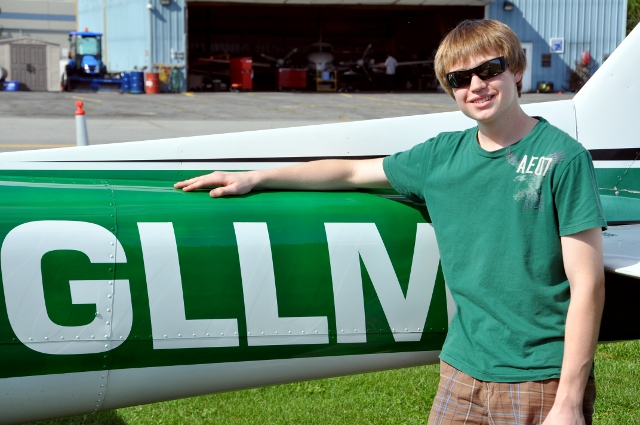 Hero: Matthew Little posing by C-GLLM following his first solo flight.