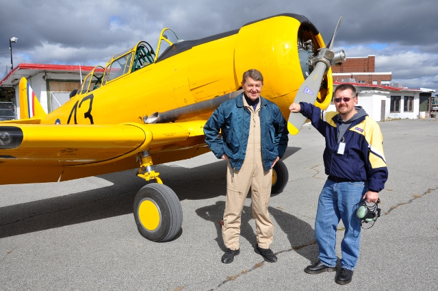Heros: John Aitken and Aaron Nichols after their flight in the Vintage Wings Harvard.
