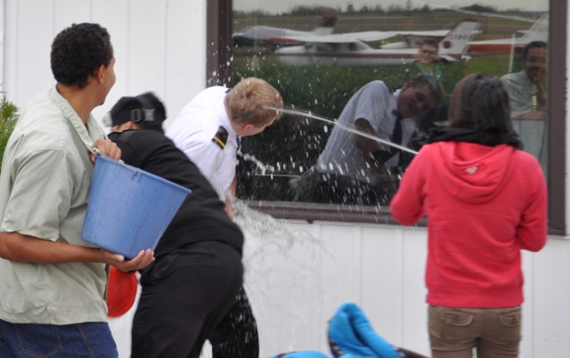 The soaking starts: Everyone likes to get involved in the celebration.
